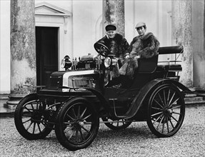 Lord Montagu with Prince Charles in 1899 Daimler, 1970.