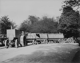1900 Fowler F5 armoured traction engine with munitions wagons. Creator: Unknown.