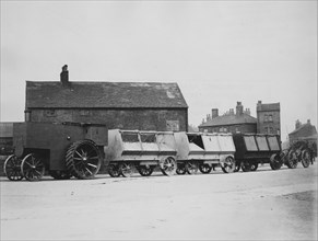 1900 Fowler F5 armoured traction engine with munitions wagons. Creator: Unknown.