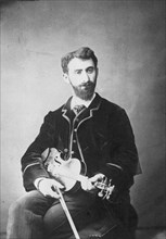 Portrait of the violinist and composer Tivadar Nachéz (1859-1930). Creator: Photo studio Ferdinand Braune, Hamburg  .