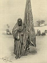 Man with flag, Nagada, Egypt, 1898. Creator: Christian Wilhelm Allers.
