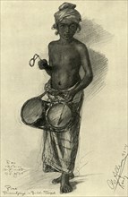Pina - drummer boy in a Buddhist temple, Kandy, Ceylon, 1898. Creator: Christian Wilhelm Allers.