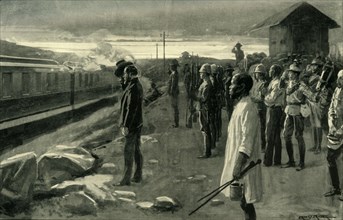 'The Train Conveying the Remains of Mr.  Rhodes Saluted by the Blockhouse Guards', 1902. Creator: Ernest Prater.