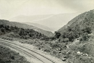 'Ascending the Mexican Cordillera, or Eastern Sierra Madre: The Railway Is Seen In The Valley Far Be Creator: Unknown.