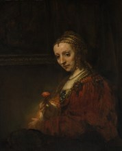 Woman with a Pink, early 1660s. Creator: Rembrandt Harmensz van Rijn.