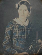 Woman with an Accordion daguerreotype, 1840s. Creator: Ron Fasand.