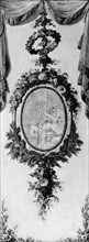 Putto in a medallion surrounded by a garland, 18th century. Creator: Unknown.