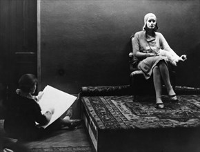 Greta Garbo is a model in the foyer of the Palladium, Malmo, Sweden, 1925.   Creator: Unknown.