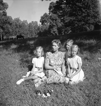 Princess Sibylla with the little princesses in Hagaparken, Stockholm, Sweden,  17/8 1944. Creator: Unknown.