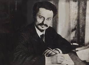 Le?on Trotsky at his writing desk , Early 1920s. Creator: Anonymous.