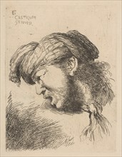 Man wearing a turban, a tie fastened around his neck, facing left, from the series ..., ca. 1645-50. Creator: Giovanni Benedetto Castiglione.