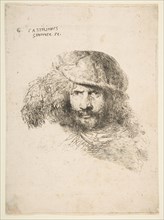Head of a man wearing a feathered cap (possibly Bernini, possibly a self portrait..., ca. 1645-1650. Creator: Giovanni Benedetto Castiglione.