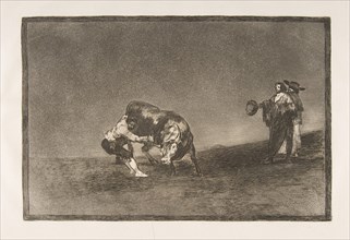 Plate 16 of the 'Tauromaquia': The same man throws a bull in the ring at Madrid., 1816. Creator: Francisco Goya.
