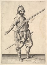 A soldier on guard freeing his right hand, from the Marksmen series, plate 37, in Wapenhandeli.... Creator: Unknown.