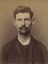 Fétis. Julien. 26 ans, né à New York (USA). Couvreur. Anarchiste. 3/3/94., 1894.