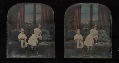 [Stereograph, Two Children Standing Between Furniture in a Studio Parlor Setting], ca. 1855.