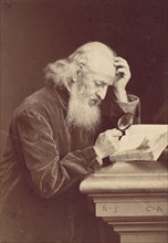 [Bearded Man with Magnifying Glass Examining a Manuscript], 1870s.