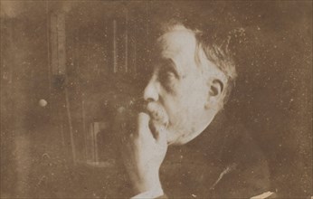[Self-Portrait in Library (Hand to Chin)], probably 1895.