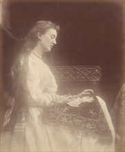 Elaine, 1874. A photographic illustration to Alfred Tennyson's "Idylls of the King"; a series of narrative poems based on the legends of King Arthur.