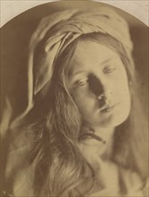 Beatrice, 1866. The model (May Prinsep) has her hair loose with a turban at the top of her head. Cameron based the model?s pose, drapery and sad expression on a painting attributed to Guido Reni that ...