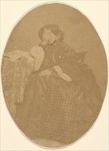 [La Comtesse at Table with Hand to Face], 1860s.