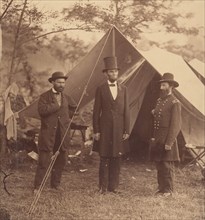 [President Abraham Lincoln, Major General John A. McClernand (right), and E. J. Allen (Allan Pinkerton, left), Chief of the Secret Service of the United States, at Secret Service Department, Headquart...