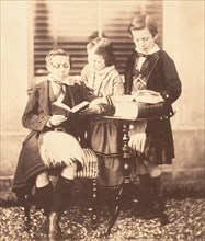 Colin and Horatio Ross Reading with Jessie Macrae, ca. 1858.