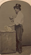 Mason in Top Hat with Mallet, Chisel, and Piece of Stone, 1870s-80s.