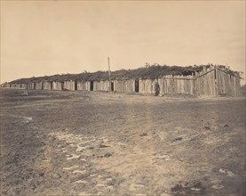 Civil War View, 1860s. (Section of log stalls [?] at City Point Virginia).