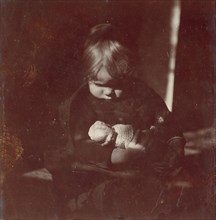 Betty Reynolds with Doll on Lap, ca. 1885.