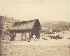Family Seated by Thatched Hut, South America, 1850s.