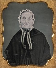Elderly Woman Wearing Glasses and a Soft Bonnet, 1850s.