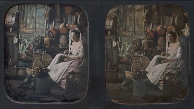[Woman in Apron and Bonnet Grinding Coffee in Kitchen Setting], 1850s.