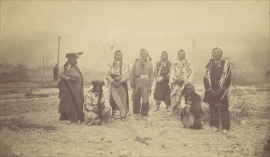 Group of Native American Men, Telegraph Poles in Background, 1880s-90s.