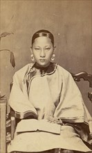 Young Woman with Earrings, 1870s.