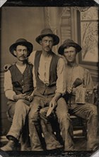 Three Painters, with Brushes and a Can of Paint, in Front of a Painted Window Backdrop, 1870s-80s.