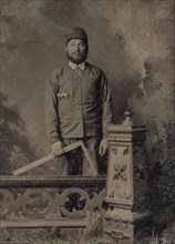Carpenter, Standing Behind a Decorative Balustrade, Holding a Square, 1870s.