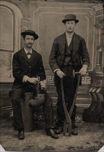 Two Stovepipe Makers, One with a Hammer and Tin Snips, the Other Sitting on Stovepipe Assembly with Tin Snips and Mallet, 1880s.