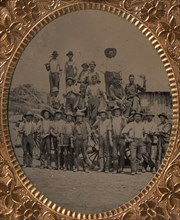 Crew of Twenty-one Workmen Posing With Tools Outdoors, 1860s-80s.