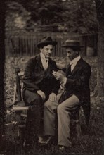 Two Men Seated on a Bench, One with His Hand on the Leg of the Other, 1870s-80s.