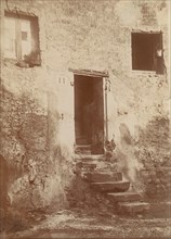 Doorway Into Crumbling Brick Building, 1850s.