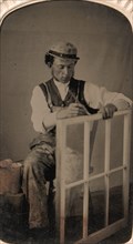 Young Man Painting Window Frame, 1860s-80s.