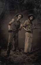 Two Bricklayers Holding Bricks and Trowels, 1870s-80s.
