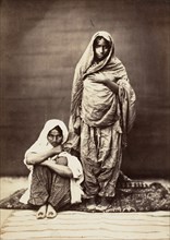 Two Indian Women, One Seated, 1860s.