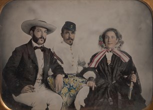 Two Men, One in Military Garb, and a Woman, Seated Around a Table, 1860s.