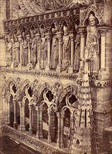 Pointed Arches, Sculptural Saints, and Rose Window on Unidentified Cathedral, 1880s.