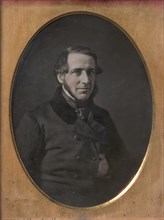 Middle-aged Man with Chinstrap Beard, Hand Tucked Inside Buttoned Jacket, 1840s-50s.