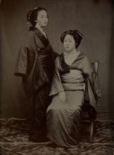 [Geisha with Attendant], 1860s.