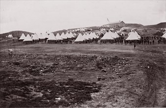 Camp of 34th Massachusetts Infantry near Fort Lyon, Virginia, 1861-65. Formerly attributed to Mathew B. Brady.
