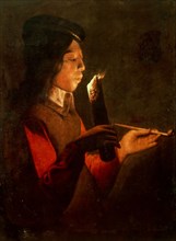 A young boy with a pipe, blowing on a firebrand (Le Souffleur à la pipe). Creator: La Tour, Georges de, (Circle) (1583-1652).